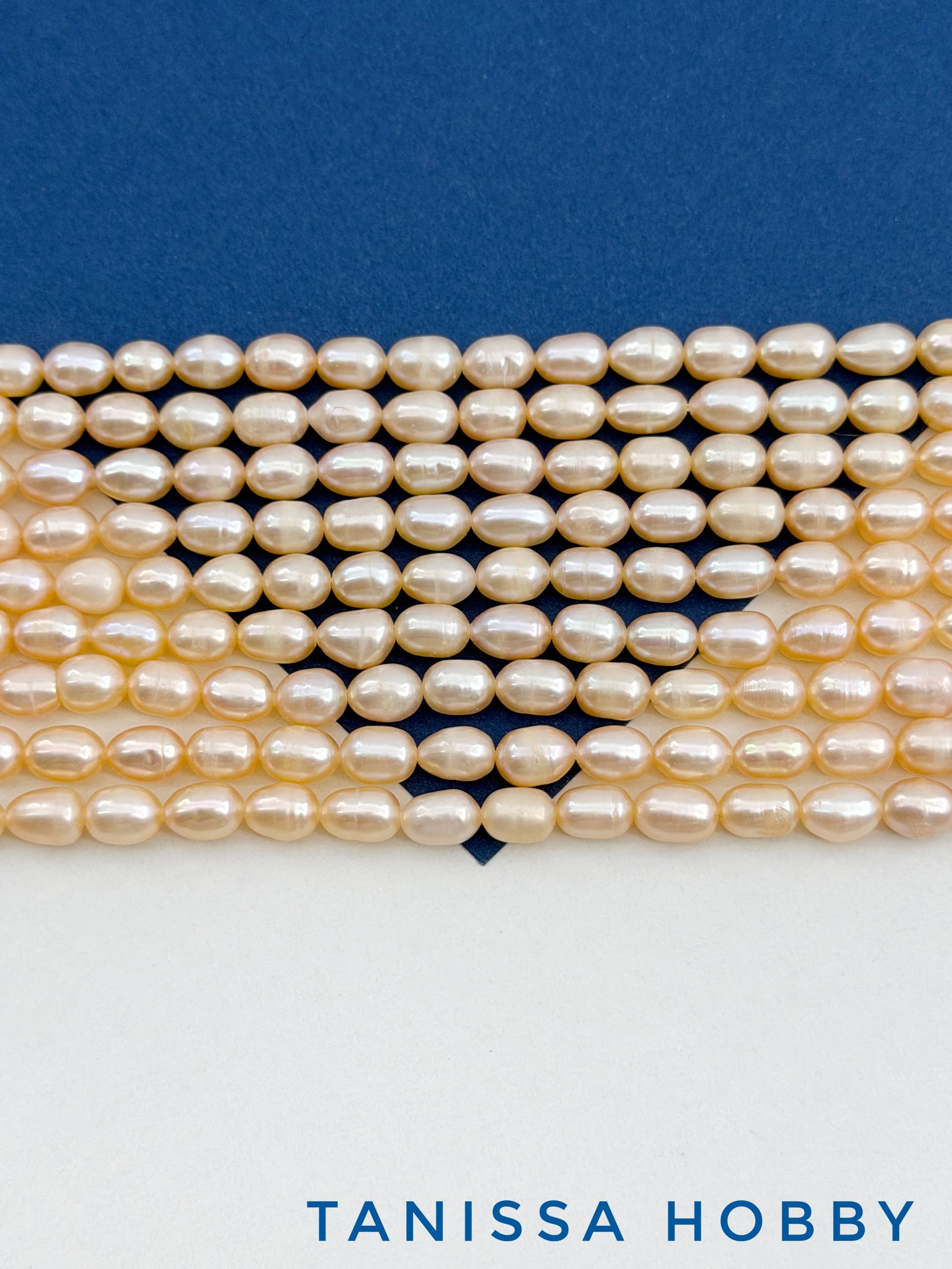 Жемчуг рис культивированный, персиковый, 7мм, А-, нить, Ж011