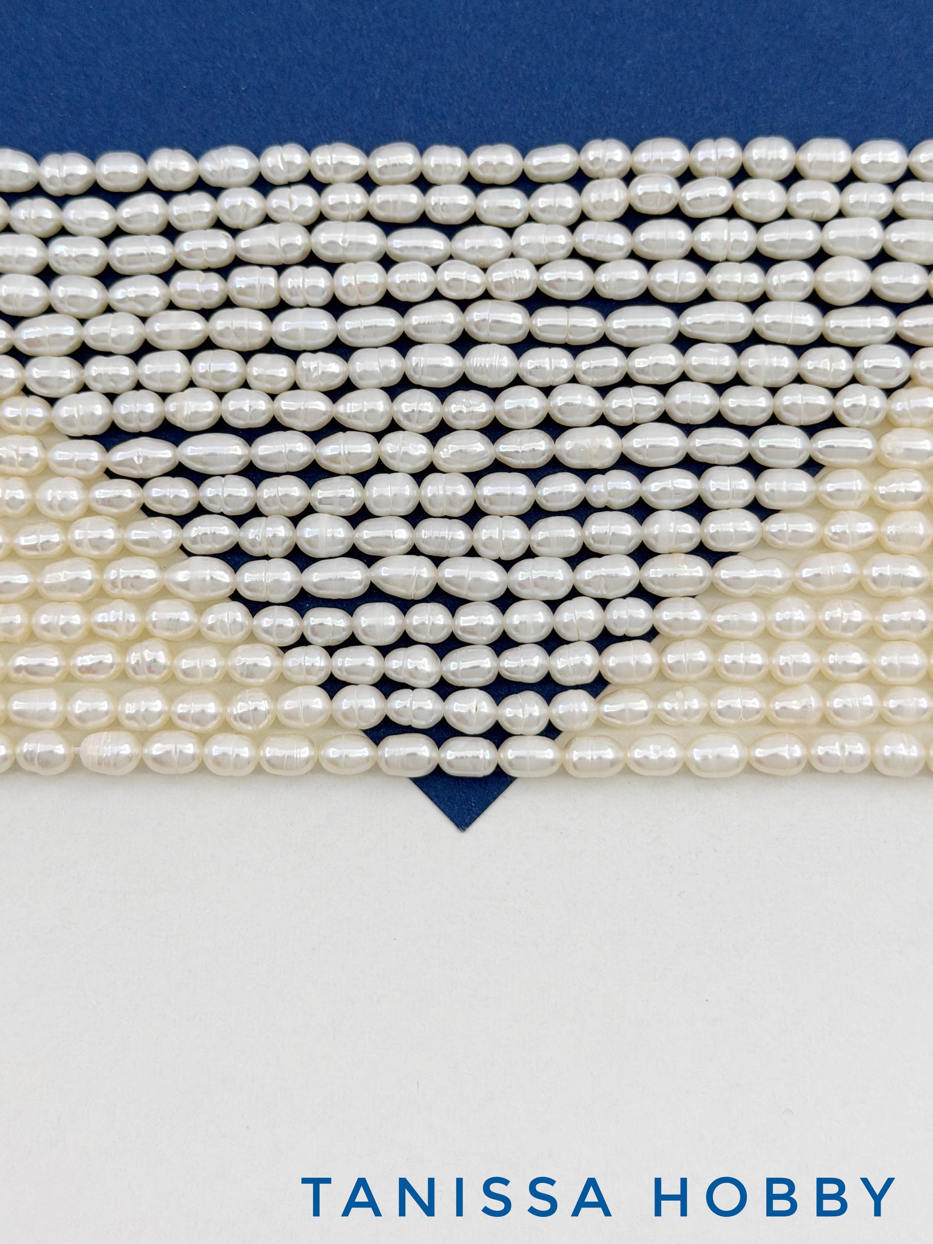 Жемчуг натуральный культивированный, рис, 7мм, 7х4мм, АВ, нить, Ж072