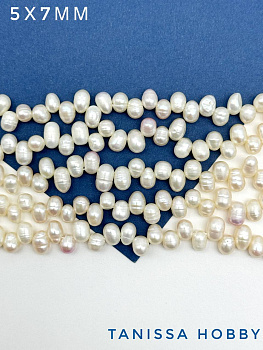 Жемчуг яйцо рис (культивированный), разноцентровой, 5х7мм, А-, 1/2 нити, Ж083