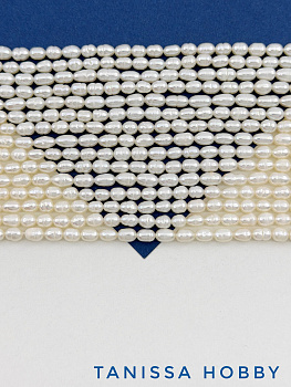 Жемчуг натуральный культивированный, рис, 7мм, 7х4мм, АВ, нить, Ж072